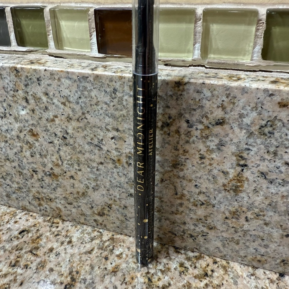 Dear Midnight Atelier dual ended eyeshadow stick in “Champagne Dream”